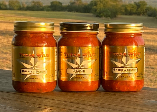 Texas Wild Gourmet Foods.  Our salsas, including Roasted Garlic, Peach, and 4X Hot & Chunky, were first created in Fredericksburg Texas starting in the 1980's - 1990's.  The original flavors of Fredericksburg TX signature series.